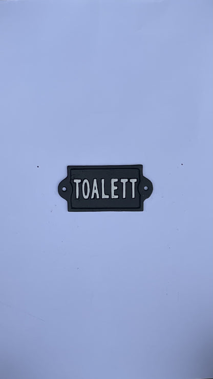 SKYLT TOALETT