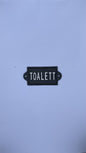 SKYLT TOALETT