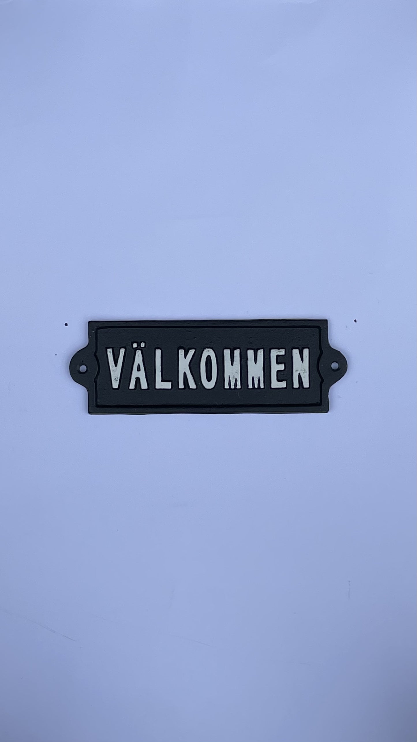 SKYLT VÄLKOMMEN