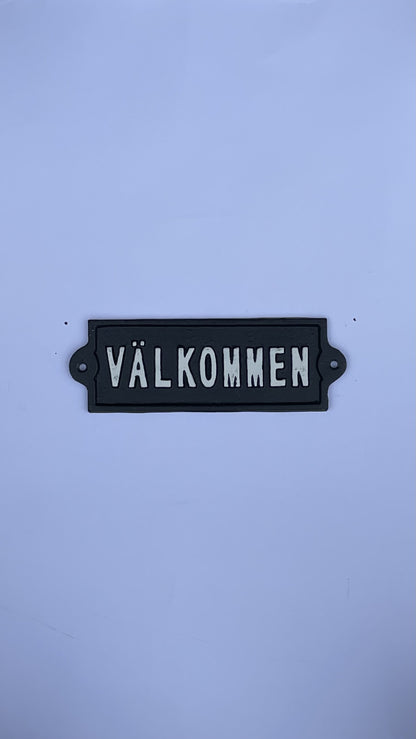 SKYLT VÄLKOMMEN