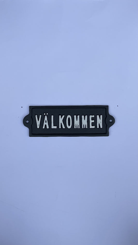 SKYLT VÄLKOMMEN